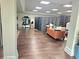 Open basement area with hardwood floors and neutral walls at 4855 West Price Rd, Sugar Hill, GA 30518