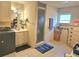 Neutral bathroom with tile flooring and a glass-enclosed shower at 4855 West Price Rd, Sugar Hill, GA 30518