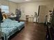 Bedroom with hardwood floors, and natural light at 4855 West Price Rd, Sugar Hill, GA 30518
