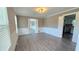 Spacious living room with great light, updated floors, and neutral paint at 4905 Puritan Dr, Sugar Hill, GA 30518