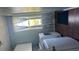 Well-lit laundry room with washer, dryer, and ample storage space at 6070 Ridge Way, Douglasville, GA 30135