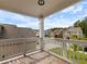 Outdoor balcony overlooking the neighborhood with beautiful views on a sunny day at 1048 Shadow Glen Dr, Fairburn, GA 30213