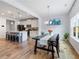 Bright dining area next to the kitchen with a modern table and chairs at 1048 Shadow Glen Dr, Fairburn, GA 30213