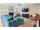 Comfortable living room with a fireplace, piano, and an open layout at 1048 Shadow Glen Dr, Fairburn, GA 30213