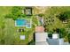 Bird's-eye view of an outdoor space with a pool, hot tub, and patio area at 10975 Hutcheson Ferry Rd, Chattahoochee Hills, GA 30268
