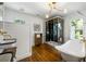 Luxurious bathroom featuring a modern glass shower, soaking tub, and stylish fixtures at 10975 Hutcheson Ferry Rd, Chattahoochee Hills, GA 30268