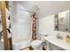 Bathroom with shower and tub combination, wooden ladder and towel rack at 10975 Hutcheson Ferry Rd, Chattahoochee Hills, GA 30268