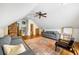 Finished attic bonus room featuring exposed brick and comfortable seating at 10975 Hutcheson Ferry Rd, Chattahoochee Hills, GA 30268