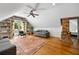 Bonus room featuring wood floors, built-in shelving, and lots of natural light at 10975 Hutcheson Ferry Rd, Chattahoochee Hills, GA 30268
