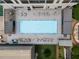 Aerial shot of rooftop pool with lounge areas and manicured lawns at 1280 W Peachtree Nw St # 1013, Atlanta, GA 30309