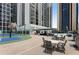 Community area featuring pool, tennis court, dining area and BBQs, perfect for social gatherings and recreation at 1280 W Peachtree Nw St # 1013, Atlanta, GA 30309