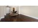 Open-concept area featuring hardwood floors and a dining table, creating a cozy spot to enjoy meals at 1280 W Peachtree Nw St # 1013, Atlanta, GA 30309