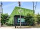 Exterior of the Center for Puppetry Arts building, featuring colorful signage and landscaping at 1280 W Peachtree Nw St # 1013, Atlanta, GA 30309