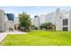 Lush green lawn in front of a modern building with unique architecture in the community at 1280 W Peachtree Nw St # 1013, Atlanta, GA 30309