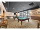 Spacious game room with pool tables, stylish lighting, and comfortable seating perfect for entertaining guests at 1280 W Peachtree Nw St # 1013, Atlanta, GA 30309