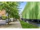 Street view of the neighborhood and community, with trees and sidewalks at 1280 W Peachtree Nw St # 1013, Atlanta, GA 30309