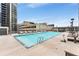 Outdoor swimming pool featuring lounge chairs for residents at 1280 W Peachtree Nw St # 1013, Atlanta, GA 30309