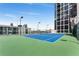 Well-maintained tennis court on the building rooftop with city views at 1280 W Peachtree Nw St # 1013, Atlanta, GA 30309