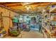 Unfinished basement featuring exposed rafters, concrete floor, and storage space at 1380 Heritage Glen Dr, Marietta, GA 30068