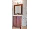 Bathroom featuring a white vanity, large mirror, and updated lighting at 1380 Heritage Glen Dr, Marietta, GA 30068