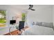 Bedroom with work-from-home space, lots of natural light, and hardwood floors at 1380 Heritage Glen Dr, Marietta, GA 30068