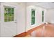 Bright entry featuring a full glass door and sidelight window for natural lighting at 1380 Heritage Glen Dr, Marietta, GA 30068