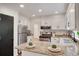 Charming kitchen with stainless appliances, granite countertops, and ample cabinet space for storage at 1380 Heritage Glen Dr, Marietta, GA 30068