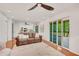 Bright living room featuring hardwood floors and sliding glass doors to outside porch at 1380 Heritage Glen Dr, Marietta, GA 30068