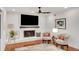 Cozy living room with fireplace and mantle features hardwood floors and comfortable seating at 1380 Heritage Glen Dr, Marietta, GA 30068