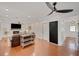 Spacious living room features hardwood floors, a fireplace, and a ceiling fan at 1380 Heritage Glen Dr, Marietta, GA 30068