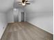 Bright bedroom with neutral carpet, closet, and ceiling fan at 2586 Gristhaven Ln, Buford, GA 30519