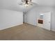 Spacious carpeted bedroom with attached ensuite bathroom at 2586 Gristhaven Ln, Buford, GA 30519