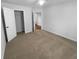 Spacious bedroom featuring carpet flooring and closet space at 2586 Gristhaven Ln, Buford, GA 30519