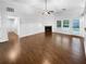 Bright living room with a fireplace, vaulted ceilings, and access to the yard at 2586 Gristhaven Ln, Buford, GA 30519