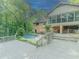 Charming backyard oasis featuring a refreshing pool and spacious deck, ideal for relaxation at 3809 Cotswold Sw Dr, Lilburn, GA 30047