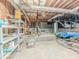 Unfinished basement with exposed ceiling, offering ample storage and customization potential at 3809 Cotswold Sw Dr, Lilburn, GA 30047