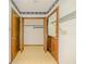 Functional laundry room with access to a closet and the exterior, providing a practical space for household chores at 3809 Cotswold Sw Dr, Lilburn, GA 30047