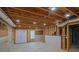 Unfinished basement with exposed beams and ductwork ready for customization at 1558 Ember Oaks Cir, Powder Springs, GA 30127