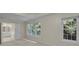 Bright main bedroom with large windows and an ensuite bathroom at 1558 Ember Oaks Cir, Powder Springs, GA 30127