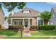 Charming home with stone accents, manicured landscaping, and a welcoming front porch perfect for relaxing at 753 Cambron Commons Trce, Suwanee, GA 30024