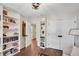 Bright office featuring a couch, bookshelves, and natural light at 753 Cambron Commons Trce, Suwanee, GA 30024
