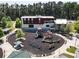Aerial view of community center featuring a playground and green spaces, perfect for Gathering activities at 963 Manor Parc Dr, Decatur, GA 30033