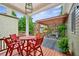 Inviting back deck with outdoor seating, string lights, and a pergola, perfect for entertaining at 963 Manor Parc Dr, Decatur, GA 30033