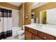 Bathroom features a shower/tub combination, matching white countertops and vanity with coordinating neutral walls at 963 Manor Parc Dr, Decatur, GA 30033