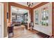 Hallway showcasing hardwood floors, elegant doorways, and access to various living areas at 963 Manor Parc Dr, Decatur, GA 30033