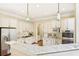 Stylish kitchen featuring stainless steel appliances, granite countertops, and neutral cabinets at 963 Manor Parc Dr, Decatur, GA 30033