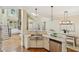 Modern kitchen with stainless steel appliances, granite countertops, and open floor plan at 963 Manor Parc Dr, Decatur, GA 30033