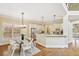 Bright kitchen with stainless steel appliances, breakfast bar, and dining area at 963 Manor Parc Dr, Decatur, GA 30033