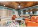 Relaxing living room boasting an elegant ceiling, cozy fireplace, comfortable seating, and sunny windows with natural light at 963 Manor Parc Dr, Decatur, GA 30033