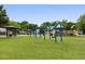 Community playground features swings, slides, and play structures, providing fun for all ages at 963 Manor Parc Dr, Decatur, GA 30033